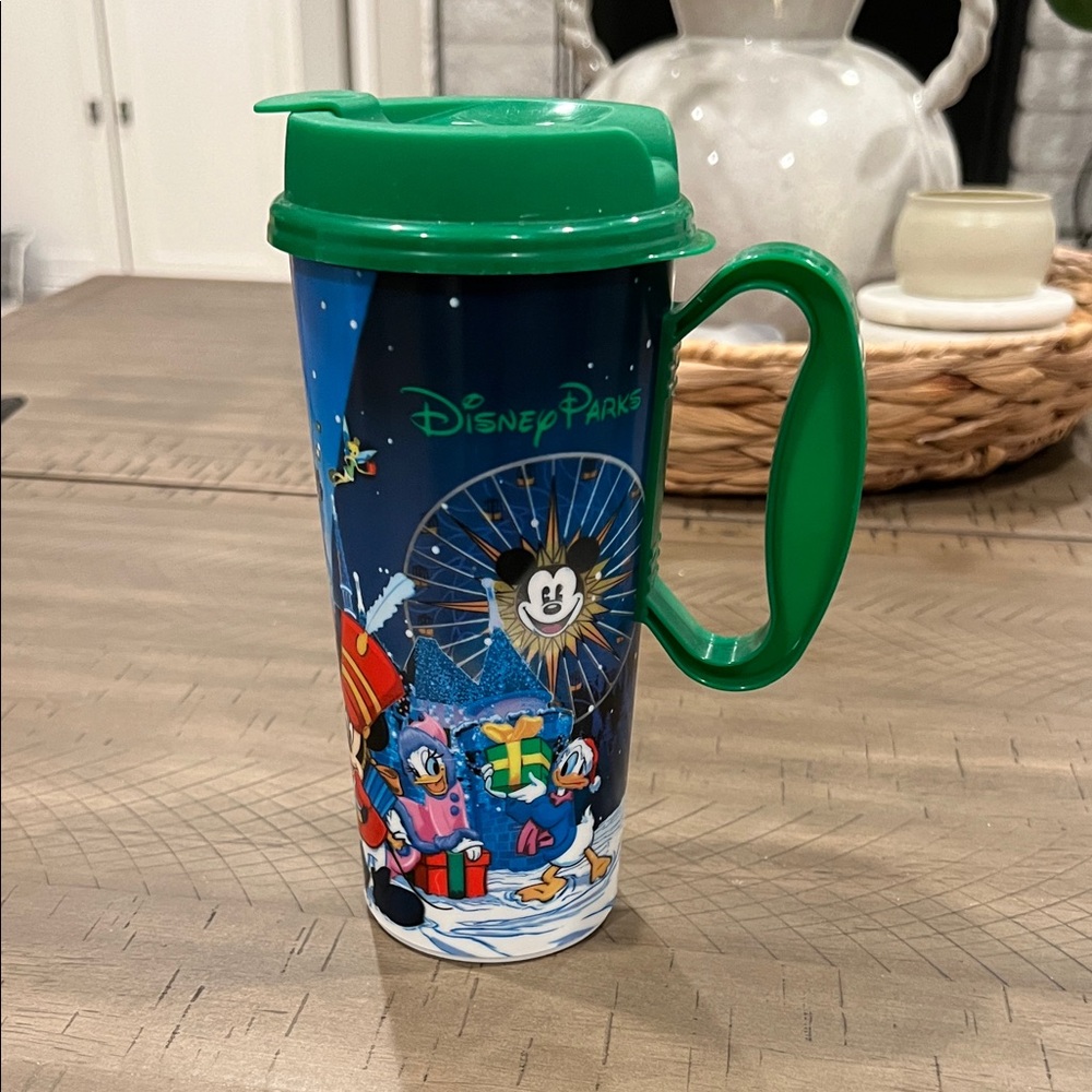 Disney Parks Travel Mug Christmas with Green Lid. EUC.